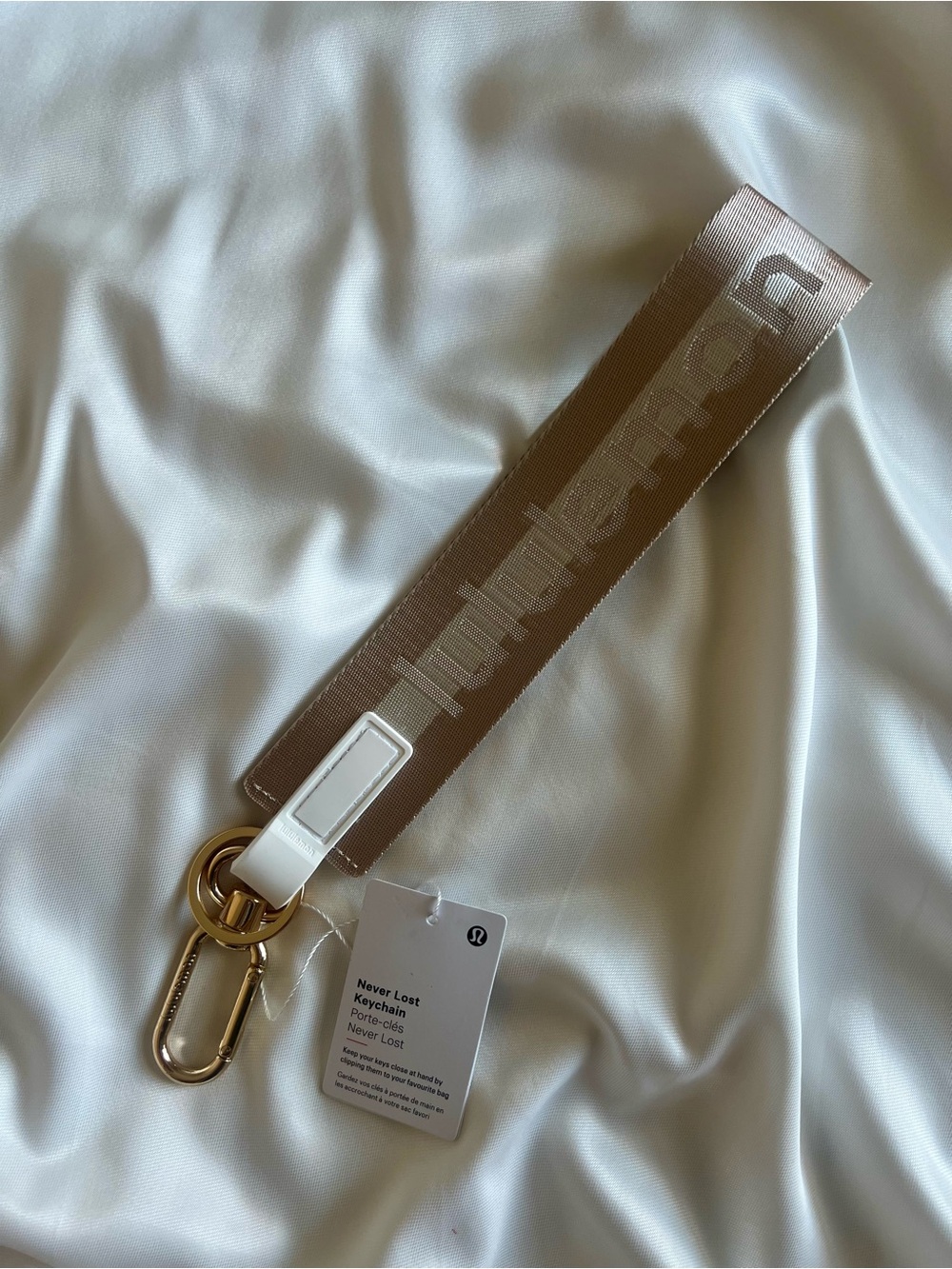 LULULEMON ATHLETIC CREAM AND GOLD HARDWARE NEVER LOSE YOUR KEYS KEYCHAIN - Picture 2 of 5